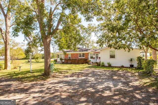 5605 Ga Highway 121, Blackshear, GA 31516 - view of front of home with a front lawn and brick siding