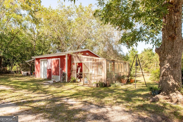 5605 Ga Highway 121, Blackshear, GA 31516 - view of greenhouse featuring a yard