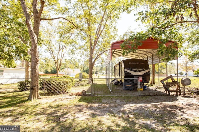 5605 Ga Highway 121, Blackshear, GA 31516 - view of yard featuring a carport and a gate