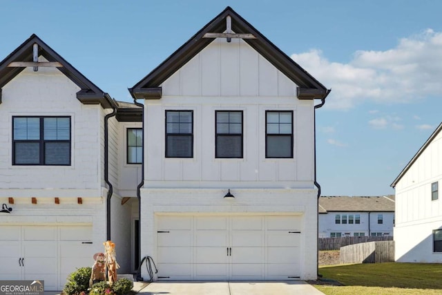 view of front of house with a front lawn and a garage