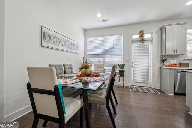 dining space featuring dark hardwood / wood-style floors