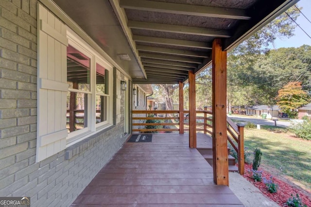 wooden terrace with covered porch