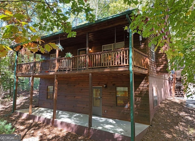 rear view of property with a patio area