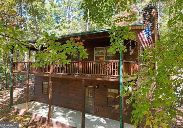 rear view of house with a patio area