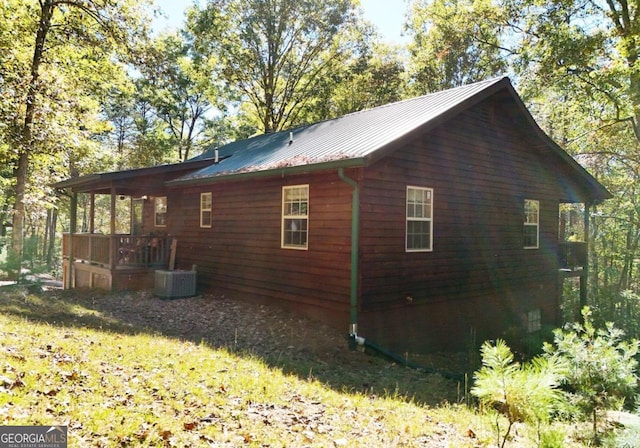 view of side of home with cooling unit