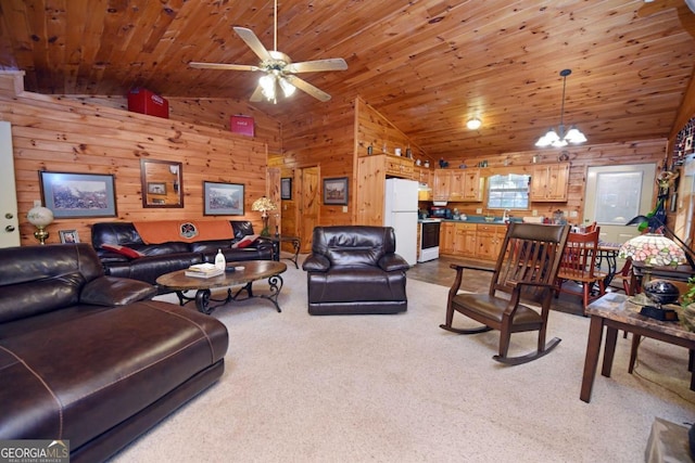 carpeted living room featuring high vaulted ceiling, wooden ceiling, wood walls, ceiling fan with notable chandelier, and sink