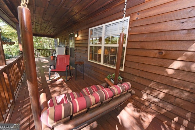 wooden terrace with covered porch