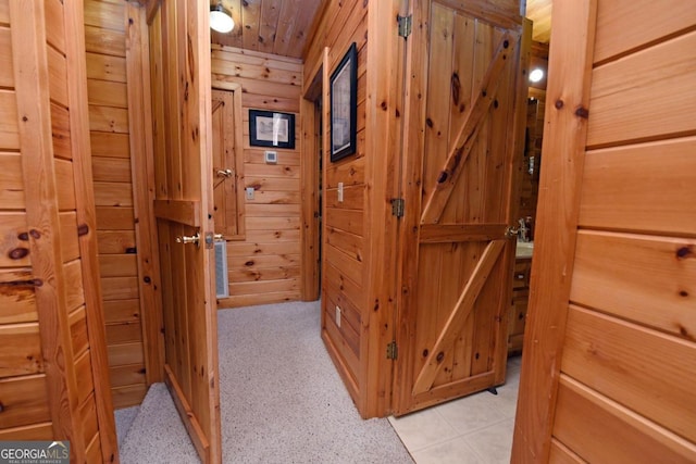 hallway with wooden walls