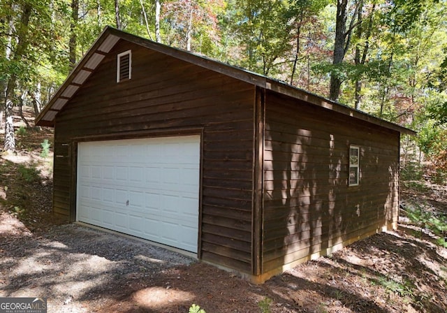 garage with wood walls