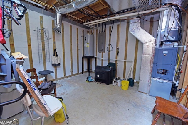 basement featuring electric water heater and electric panel