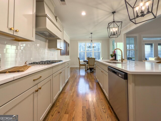 unfurnished dining area featuring a chandelier, crown molding, and dark hardwood / wood-style flooring