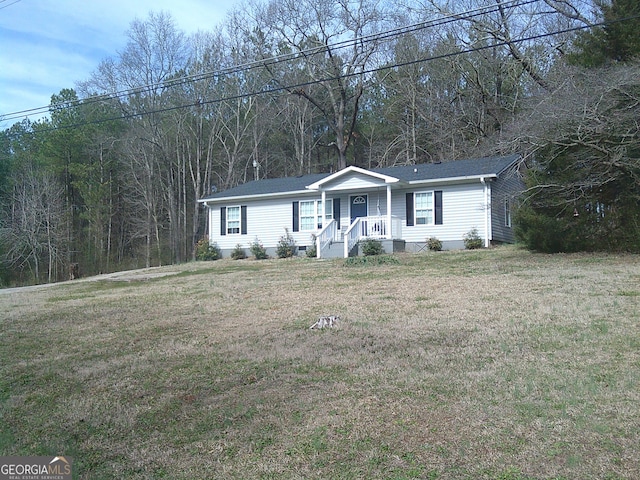 view of front facade with a front yard