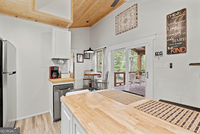 kitchen with hanging light fixtures, white cabinetry, wood ceiling, and appliances with stainless steel finishes