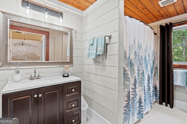 bathroom with vanity, wood ceiling, tile patterned floors, and curtained shower