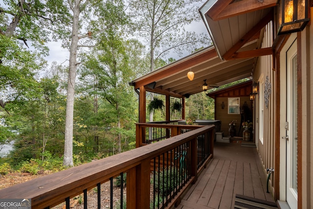 wooden terrace with ceiling fan