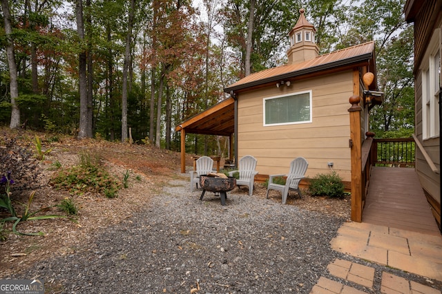 exterior space featuring a fire pit