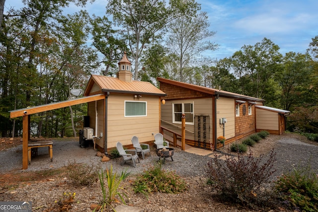 rear view of house featuring a patio area