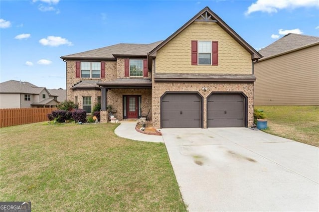 view of front of property featuring a front lawn and a garage