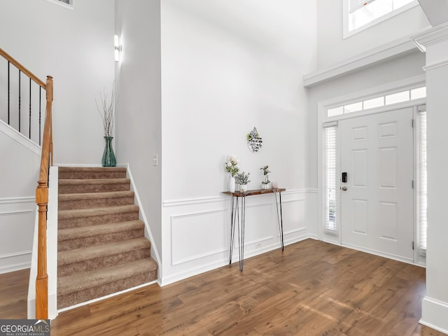 foyer entrance with hardwood / wood-style flooring