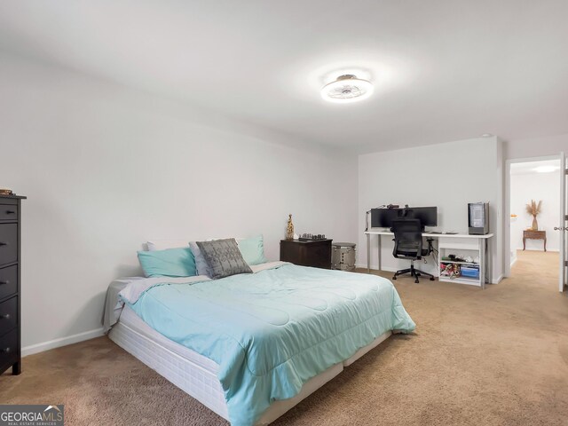 bedroom featuring carpet