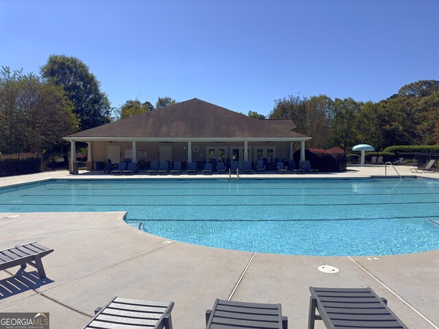 view of pool featuring a patio area