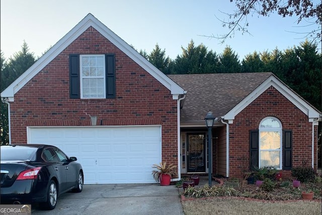 view of front of property featuring a garage