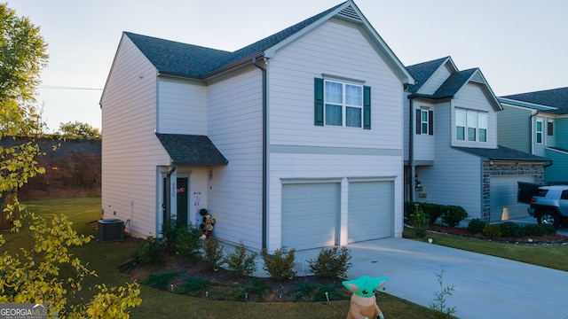 view of front of property with a garage