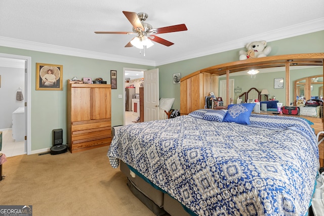 bedroom with a textured ceiling, ceiling fan, light carpet, connected bathroom, and crown molding