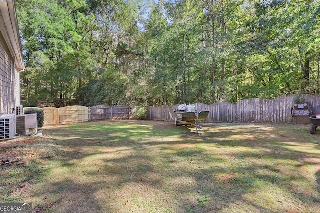 view of yard featuring central AC