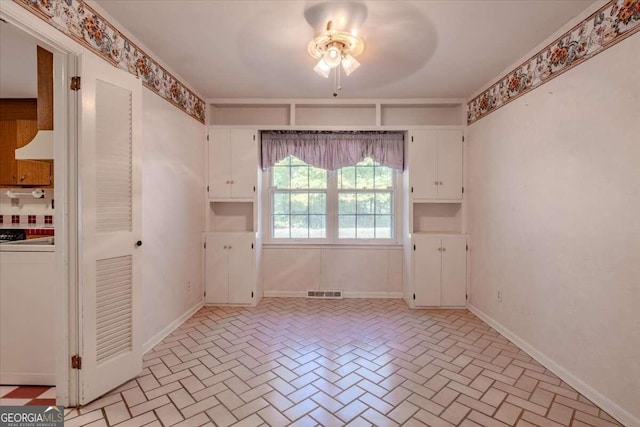 interior space featuring washer / dryer and ceiling fan