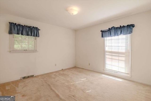 view of carpeted spare room