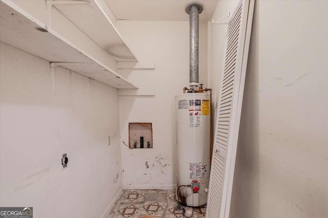 washroom featuring hookup for an electric dryer, hookup for a washing machine, and water heater