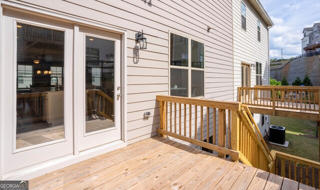 wooden terrace with cooling unit