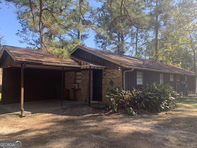 exterior space featuring a carport