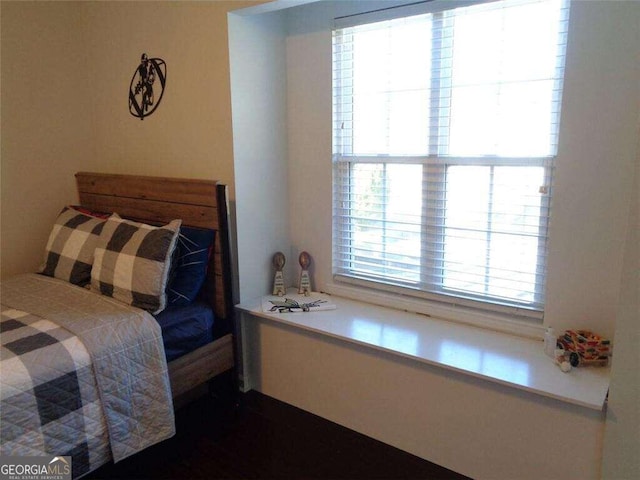 bedroom with multiple windows