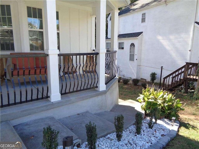 entrance to property featuring covered porch