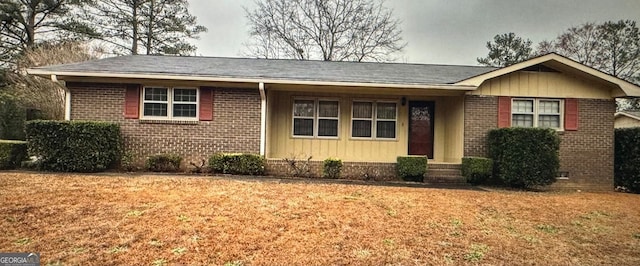 ranch-style house with a front lawn