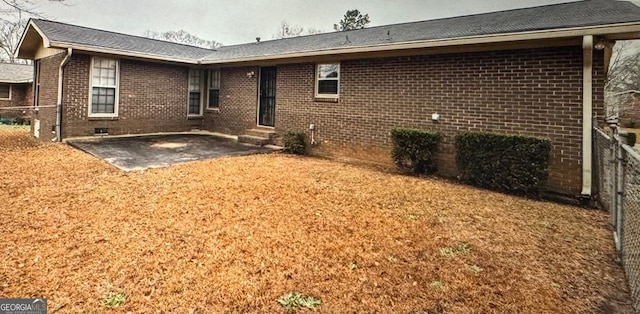 back of property featuring a patio