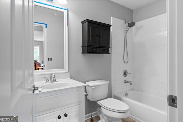 full bathroom featuring vanity, toilet, and tiled shower / bath combo