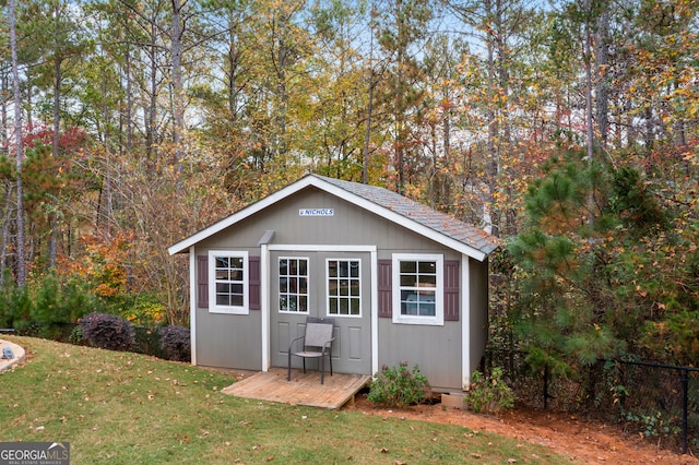 view of outdoor structure with a yard