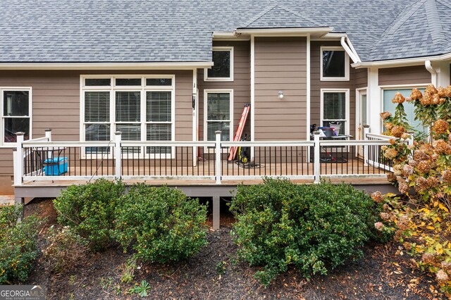 rear view of house with a deck