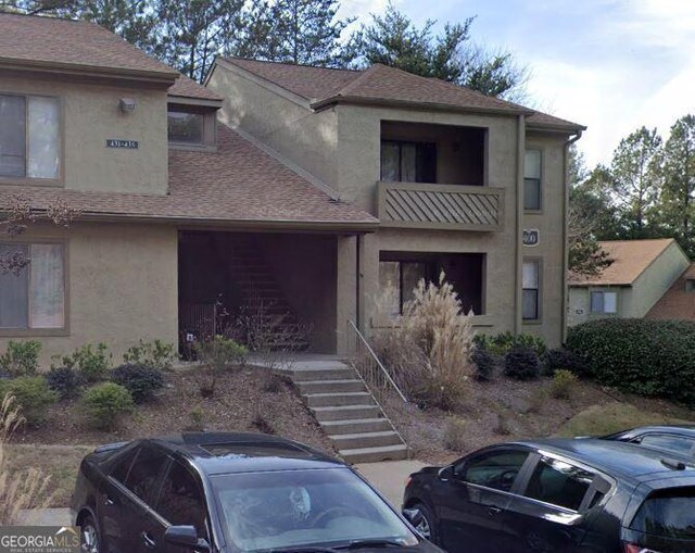 view of property featuring a balcony