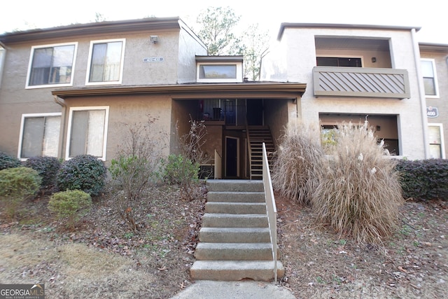 view of property featuring a balcony