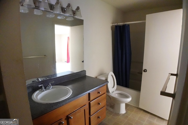 full bathroom with vanity, toilet, tile patterned flooring, and shower / bath combo