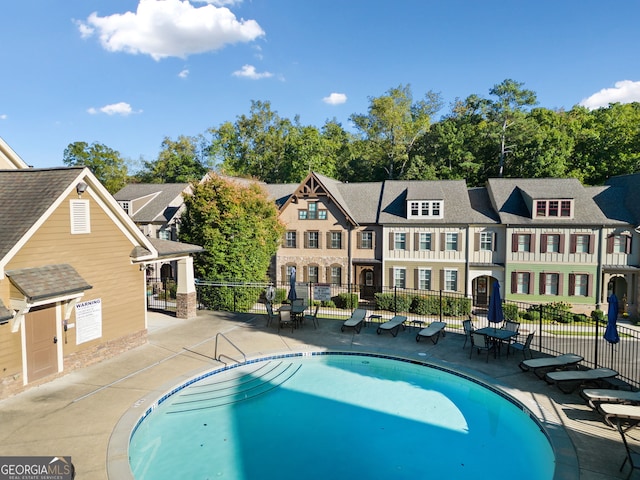 view of swimming pool featuring a patio