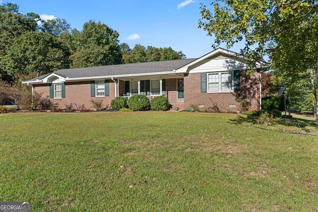 ranch-style house featuring a front yard