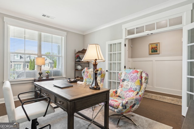 office with ornamental molding and hardwood / wood-style floors