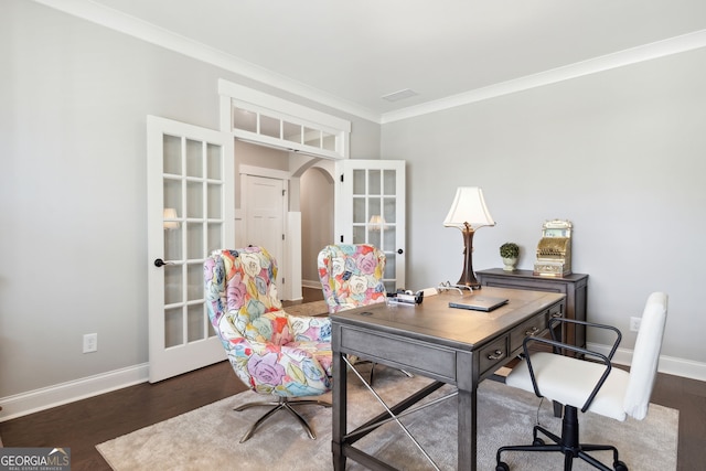 office area with wood finished floors, ornamental molding, french doors, arched walkways, and baseboards
