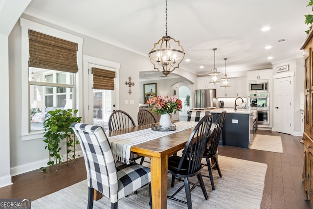 dining area with a chandelier, visible vents, dark wood-style floors, and recessed lighting