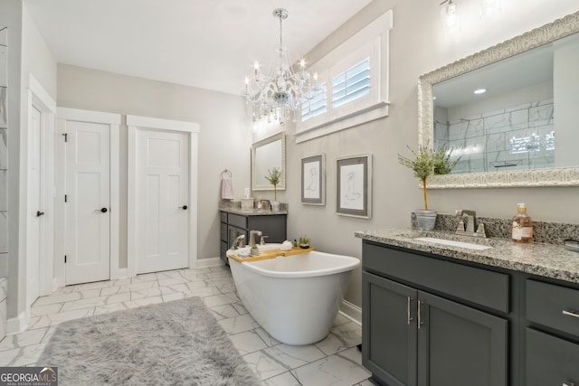 bathroom with vanity and independent shower and bath